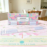 Clear foldable Mahjong tile rack set with decorative retail packaging