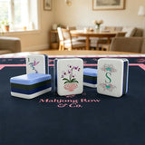Hummingbird and orchid hand-painted acrylic Mahjong tiles with striped edges