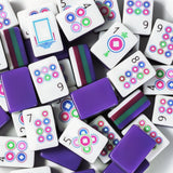 Purple acrylic Mahjong set with white tiles and colourful patterns