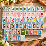 American Mahjong tiles in colorful designs displayed on matching racks