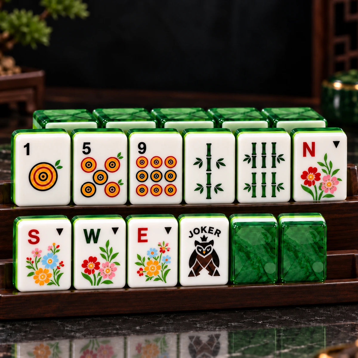 Emerald green mahjong set in four-layer acrylic, tiles arranged on a double-tier wooden rack