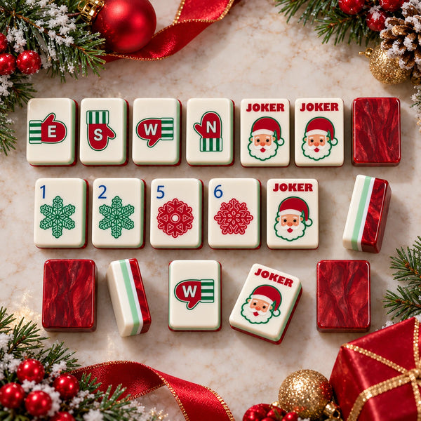 Mitten wind tiles, Santa joker tiles and snowflake tiles with red tile backs among Christmas decorations