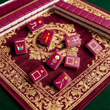 Single-layer neon purple mahjong tile set displayed on a luxury patterned game mat with colourful custom tile designs