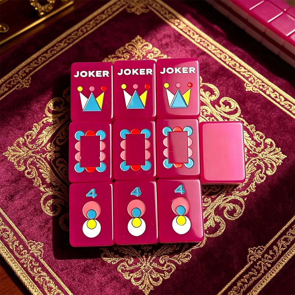 Single-layer neon purple mahjong tile set featuring custom joker designs and colourful patterns displayed on a luxury game mat