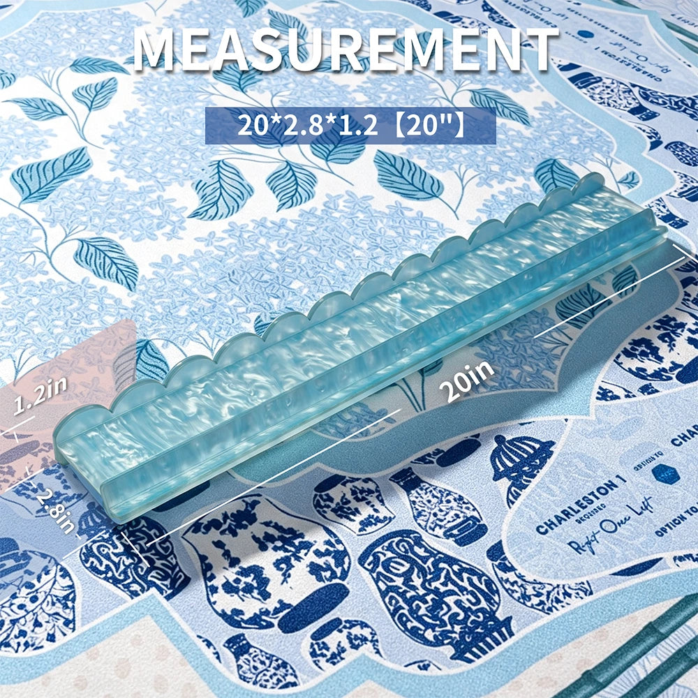 Aqua mahjong pusher tool displayed with transparent acrylic construction