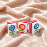 Beige background mahjong display with colorful premium tiles