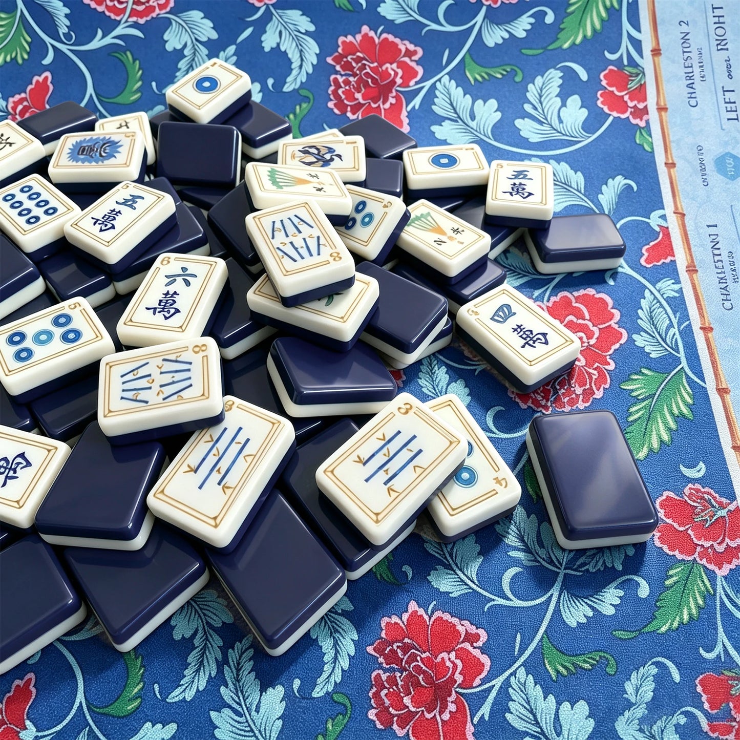 Blue mahjong tile set arranged in a premium display