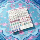 Blue pastel mahjong table display with elegant tile setup