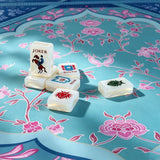 Blue pastel mahjong table with colorful tile arrangement