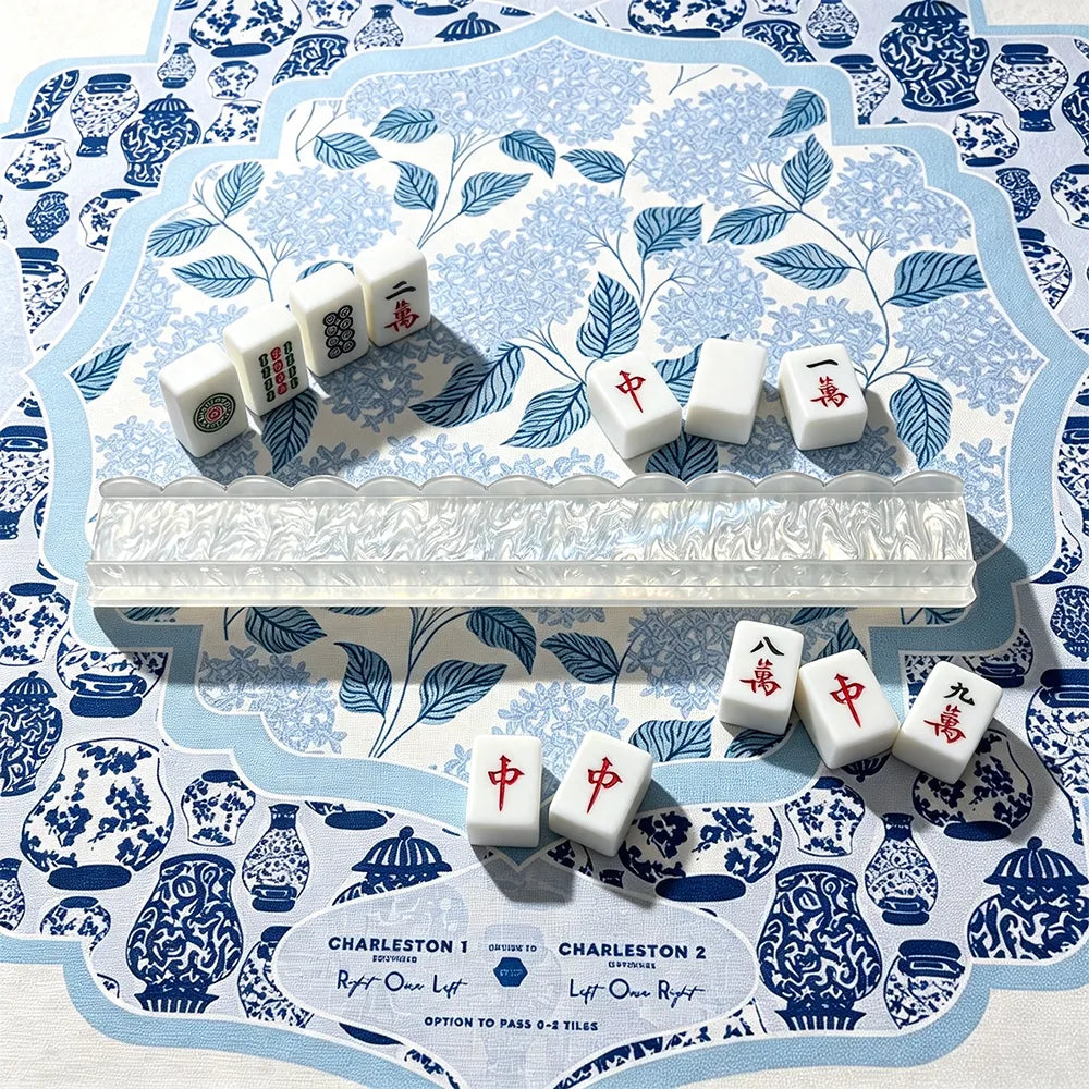 Blue and white mahjong push stick with ceramic tile design and elegant Chinese pattern background