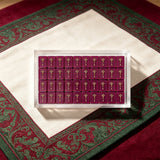Burgundy mahjong table with premium tile arrangement