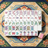 Classic green mahjong table with traditional tile arrangement