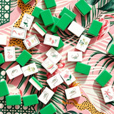 Colorful mahjong tiles arranged for display