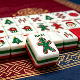 Emerald and red mahjong table scene with decorative tile layout
