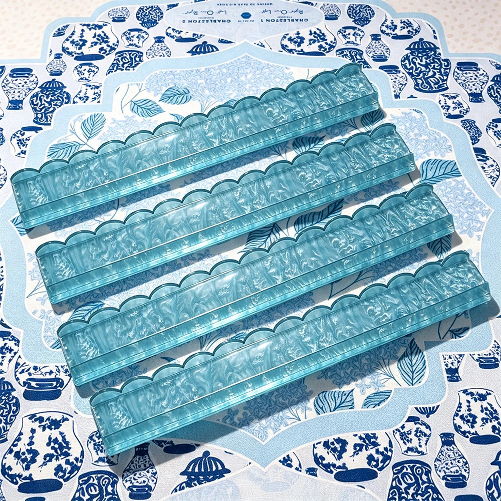 Green acrylic mahjong tile pusher with smooth edges and lightweight design