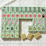 Green mahjong table design with organized tile layout
