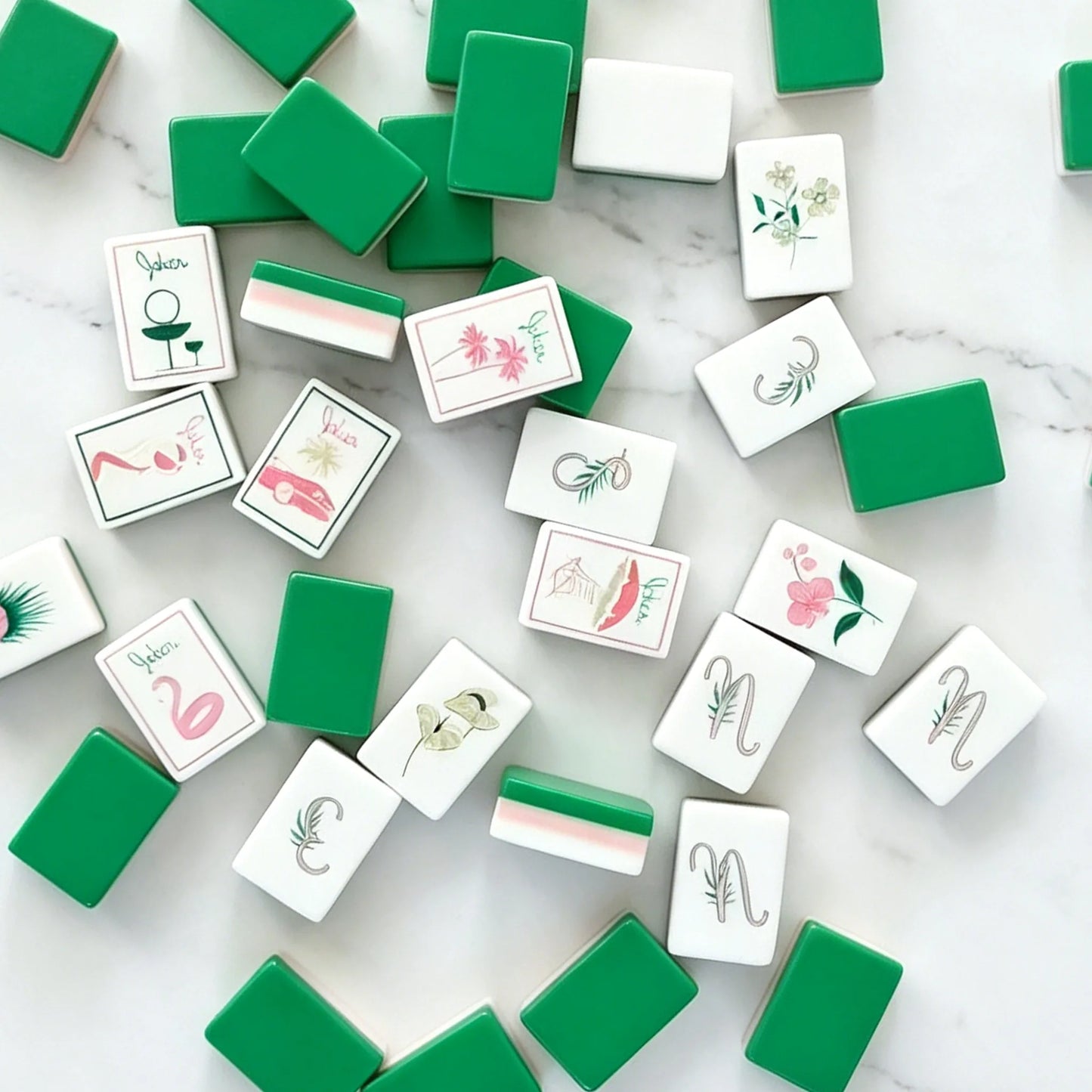 Green mahjong tiles arranged in an elegant display