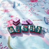 Icy blue mahjong display with stylish tile arrangement