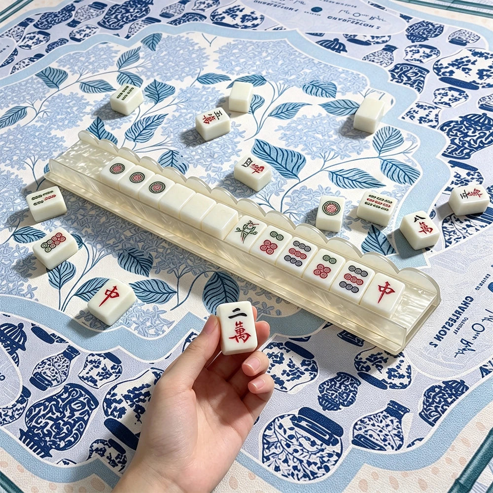 Mahjong pusher hand use detail showing practical tile pushing function