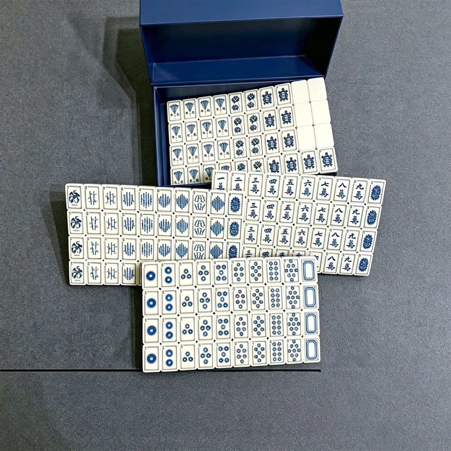 Modern white mahjong set with stylish table design