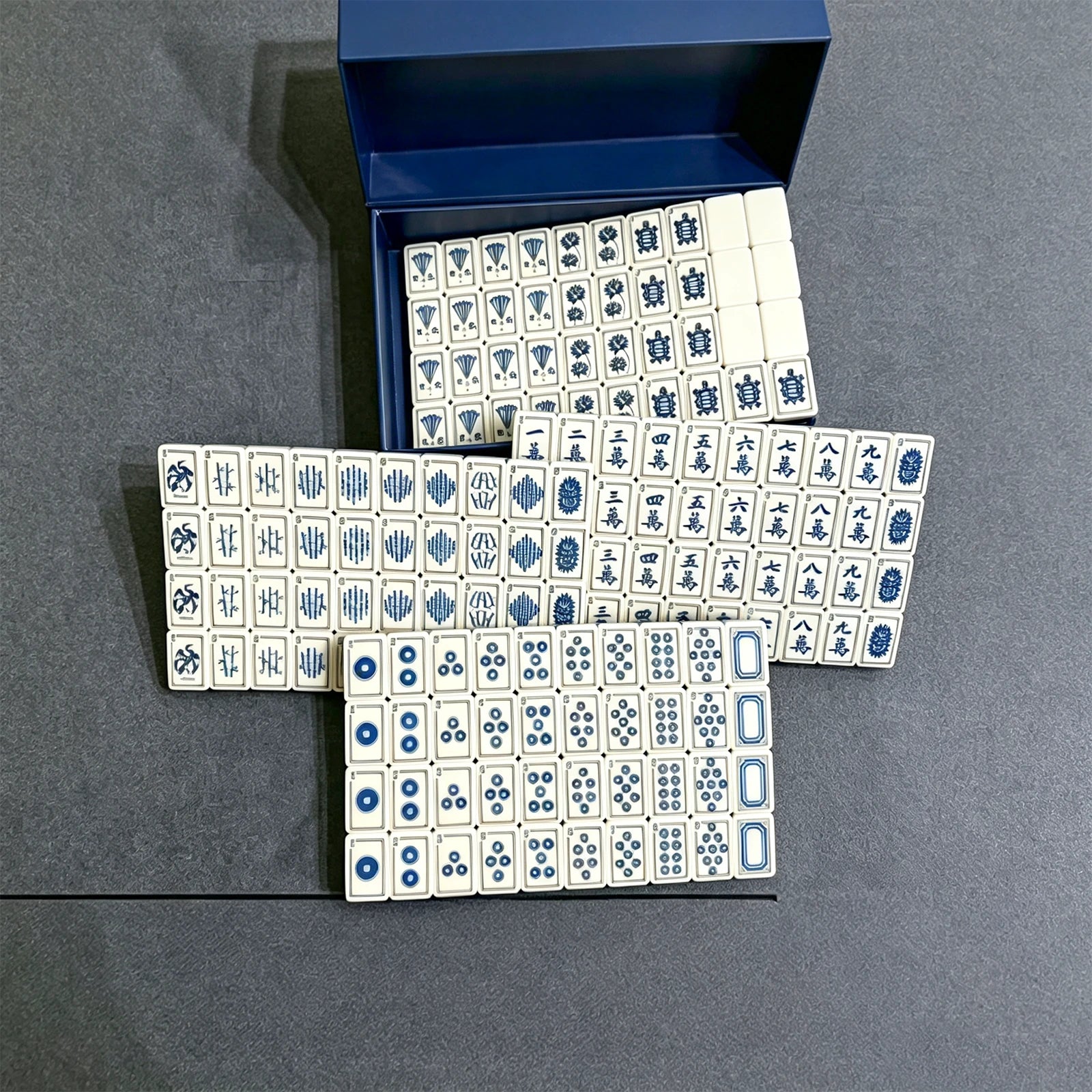 Modern white mahjong set with stylish table design