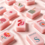 Close-up view of elegant pink mahjong tiles