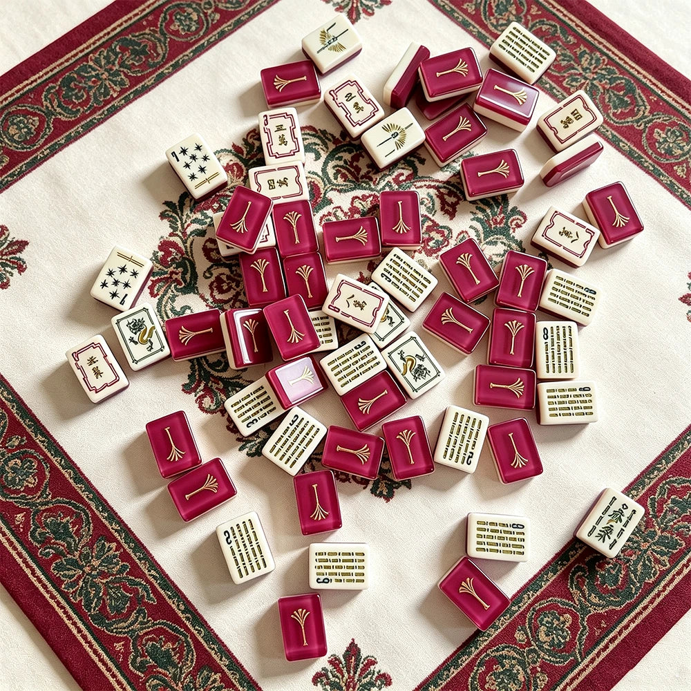 Red mahjong tile set arranged in a luxury display setting