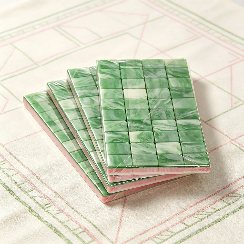 Sage green mahjong set with elegant storage and tile arrangement