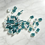 White and blue mahjong tiles arranged in a modern display